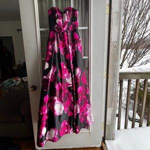 A never been worn before strapless size 5/6 Black and Pink long dress.